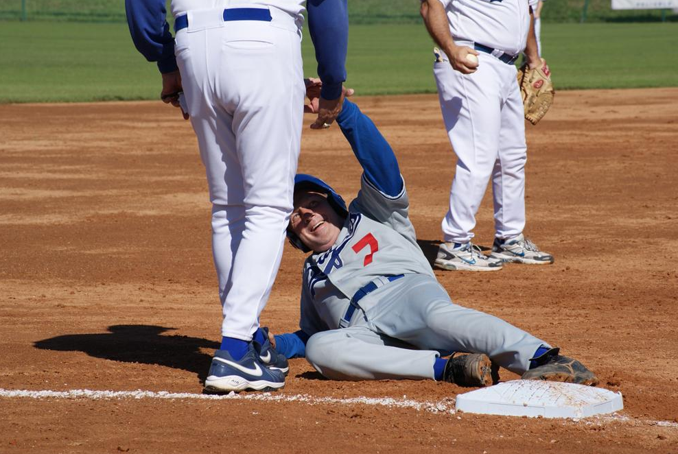 Stan Defehr (Bartlesville, OK) enjoys just beating the throw going 1st to 3rd on a base hit.....