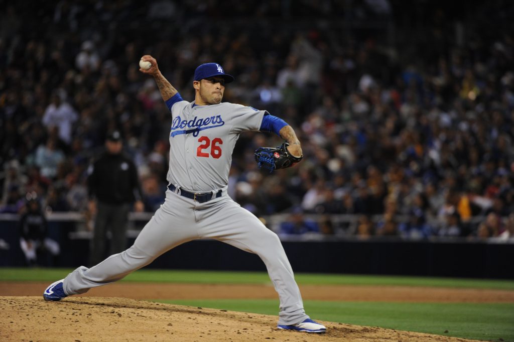 In 10 games this month, Sergio Santos and the Dodger bullpen have allowed 32 baserunners in 28 1/3 innings. (Jon SooHoo/Los Angeles Dodgers)