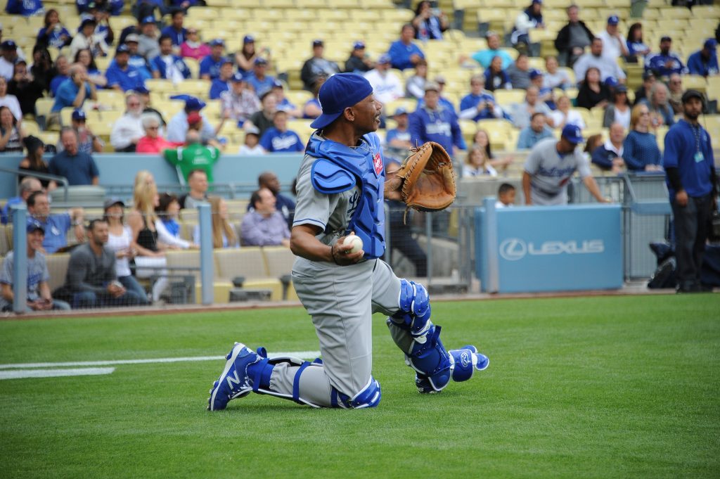 Though he caught only six games in a 15-year career, Derrel Thomas embraces the opportunity to go behind the plate, such as at the Dodgers' Old-Timers Game on May 16. (Juan Ocampo/Los Angeles Dodgers)
