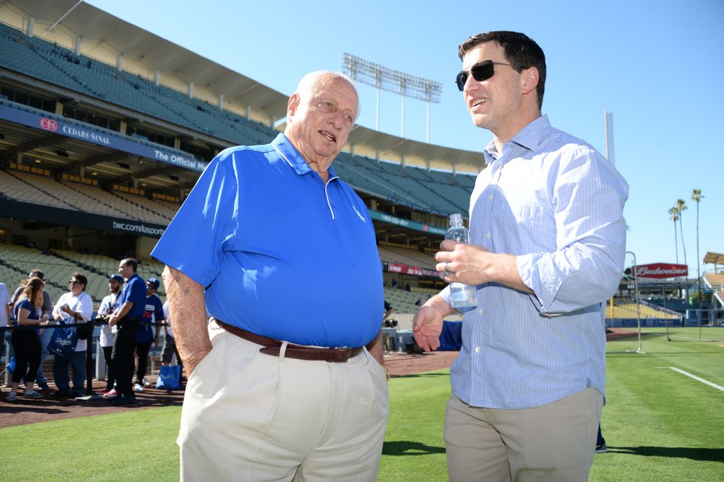 Tommy Lasorda, one of the people not interviewing for the Dodger managerial opening, with Andrew Friedman. (Jon SooHoo/Los Angeles Dodgers)