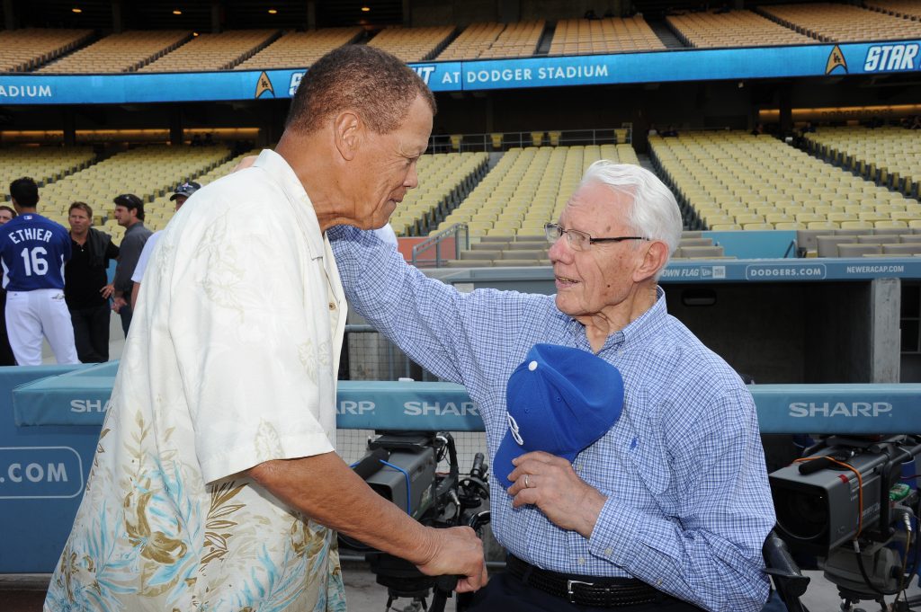 Maury Wills greets Lee Pfund in August 2012 (Jon SooHoo/Los Angeles Dodgers)